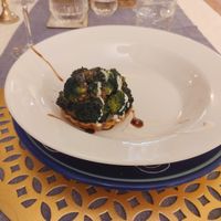 Tortino di pasta friabile con crema di porcini selvatici e broccoli at Emanuele Di Biase in Perugia