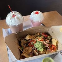 Vegan nachos with taco “meat” and a chocolate and strawberry shake  at Stand-Up Burgers in Berkeley