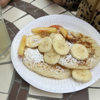 vegan pancakes with fruit  at Pan Café in Sassari