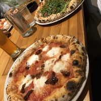 Magarita with mozarella buffala and vegan pizza with ruculla and vegetables. Both very good. at Majstor i Margarita in Belgrade