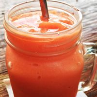 Guava, passion fruit, papaya, orange juice, sour sop and basil seed smoothie  at Green Guru in Canggu