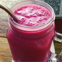 Dragon fruit, strawberry, raspberry, banana and coconut nectar smoothie  at Green Guru in Canggu