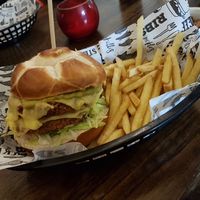 Chicken style burger & fries - Double breaded meat free patty, dairy free cheese, red pepper salsa and guacamole at The Yard in Ilkley