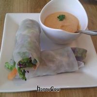 Spring Rolls: Finely sliced vegetables with fresh herbs wrapped in rice paper & served with tangy Thai dipping sauce. at Rawlicious - Bloor St in Toronto