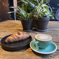 Croissant and cappuccino with oatmilk  at The Greens in Berlin