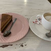 Tiramisu cake and cappuccino with soy milk at Sublimmme in Bucharest