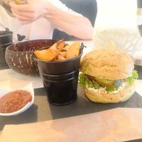 Chickpea burger and baked potatoes with a spicy sauce  🍔 at Sublimmme in Bucharest