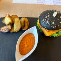 Burger with potatoes at Sublimmme in Bucharest