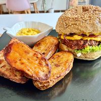 Protein burger with sweet mustard and wedges at Sublimmme in Bucharest