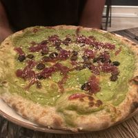 Vegana, broccoli sauce with caramelized onions, olives and breadcrumbs  at Amuni in Bruges