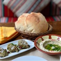 Hummus beiruti, baba ganoush and Arabic bread. at Al Sham in Dushanbe