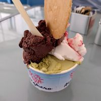 Fondente (dark chocolate), pistachio, strawberry cheesecake at Azzurra Ice Cream in Alghero
