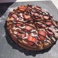 Waffles vegan choc and strawberries  at Creme Cafe in Lanzarote