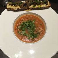 Gazpacho (cold soup) and a crostini with hummus and cooked vegetables at La Tomate Noire in Corsica