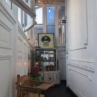 Back hall with seating at Vegan Dealer in Santiago