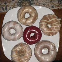 From top going clockwise: apple cider, French toast, lemon, French toast, and pear. Middle: black raspberry. at Cider Belly in Albany