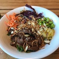 Salad bowl with Teriyaki Gardien chicken strips, pineapple, and edamame  at Cafe Surfinista in Indialantic
