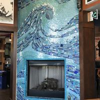 Mosaic fireplace. Awesome decor in surfinista cafe! at Cafe Surfinista in Indialantic