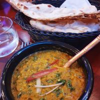 Dal lentils and spinach, vegan naans at Royal India in Ghent