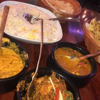 Eigenaar is vegan en verrukt om zijn speciale vegan kaart erbij te pakken. Vele opties veel lekkers. Vooral de mango naan 🤩  at Royal India in Ghent