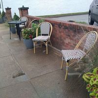outdoor seating on a rainy day at Native Bagel Company in Berea