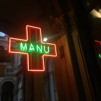 Look for this neon sign down the alley off the main road  at MANU+ in Budapest