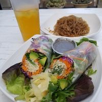 Avocado Prism Roll with tahini dressing and pickled ginger on the side. Jasmine green tea. Sweet potato noodles. at Nancy's Sky Garden in Austin