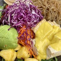 Signature Plate with sweet potato noodles, rainbow salad, mango tofu (I don’t recommend the flavor), peanut soy dressing, and added avocado 🥑   at Nancy's Sky Garden in Austin