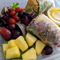 Hummus/Avocado Prism Roll with fruit at Nancy's Sky Garden in Austin