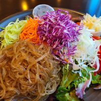 Sweet potato noodles, no protein, toasted sesame dressing. Add pickled ginger.😋 at Nancy's Sky Garden in Austin