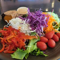 Signature plate. No protein or fruit. Baked sweet potato. at Nancy's Sky Garden in Austin