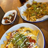 Vegan nachos, BBQ cauliflower wings, and chip shop bites loaded fries  at Meadow Farm in Redditch