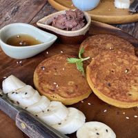 Potato pancakes with syrup and banana  at Pure Vegan Heaven in Koh Samui