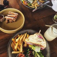 Spring rolls, shelter burger (meat) and veggie burger (made vegan) 💚 at Shelter Cafe in Seminyak