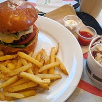 Burger with fries and slaw at Flipside in London