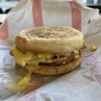 Sausage breakfast sandwich with avocado  at Flipside in London