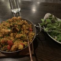vegan paella feast and dressed greens at Our Harvest in Fenwick Island