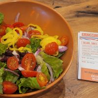 Greek salad with vegan cheese instead of feta at Blaze Pizza in Melbourne