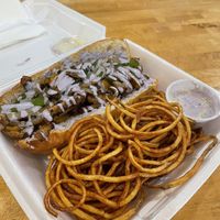 Philly Cheesesteak with Pride Aioli Sauce   at Blue Sage Vegan Bistro in Little Rock