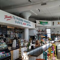 Serves food and smoothies at Tiki Loco in Dallas