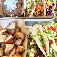 Tacos with potatoes and refried beans   at Tiki Loco in Dallas