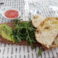 Bread with olive oil, greens, tomato, and avocado at La Concepción in Tenerife