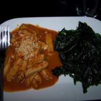 peanut sauce chicken with crispy spinach at ChuChai in Montreal