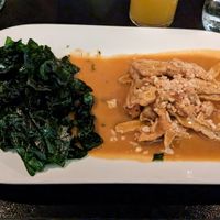 PHRA RAM GAI (vegan chicken and fried spinach) with vermicelli on the side at ChuChai in Montreal