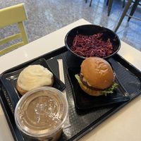 Smoothie, cinnamon bun, coleslaw and burger 🍔   at Copper Branch in Ottawa