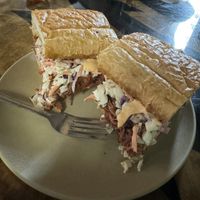 Never been disappointed here. This is then pulled jackfruit bbq Sammy. Made with Gambino’s French bread which is based on New Orleans and is delicious. Spicy but tasty!   at Cafe Single Fin in Pensacola