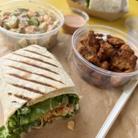 Caesar wrap, chic’n nuggets and potato salad.   at Ely's To Go in Boardman