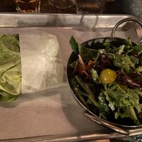 Had the Beyond Burger without the bun. It comes with vegan cheese and thousand island dressing. I chose the side salad over fries   at Newhall Refinery in Santa Clarita