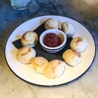 Vegan Dough-balls served with Tomato & Harissa Dip  at Pizza Express in Stratford-upon-avon