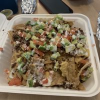 My husband isn’t the biggest nacho fan, but he dug into this with me. Nachos Supreme at Healthy Substance - Garfield Ridge in Chicago